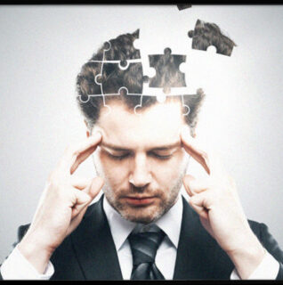 Image of men thinking with his brain with puzzle pieces